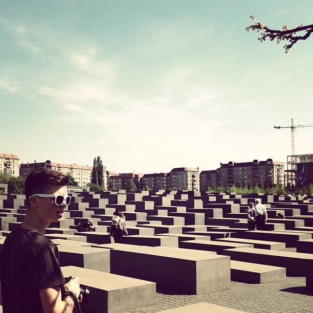 A man next to the "Memorial to the Murdered Jews of Europe" in Berlin