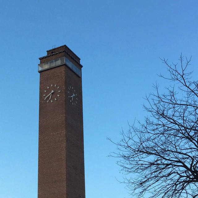 Minimal narrow watch tower made of red bricks