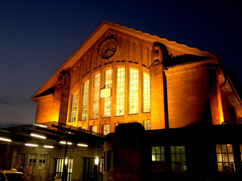 a art nouveau train station at night