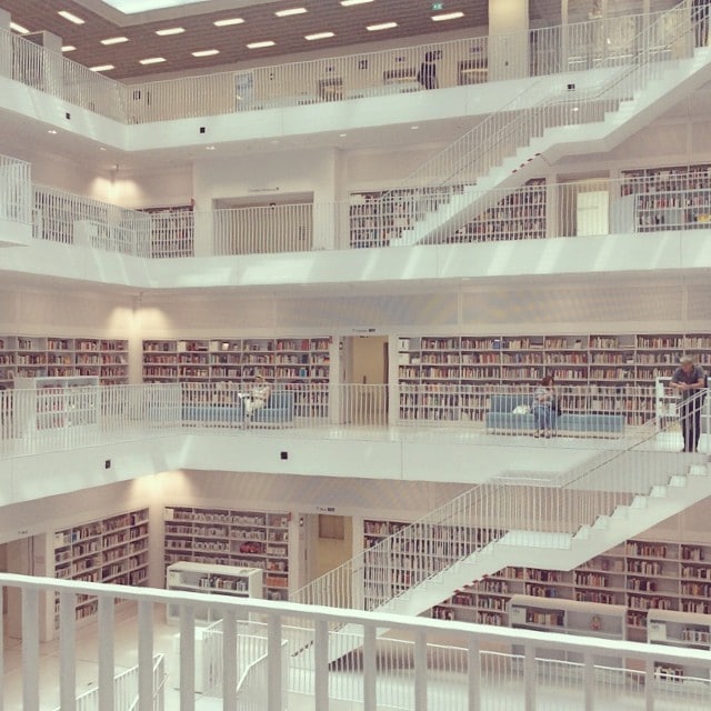 Multi level public library with white walls and floors