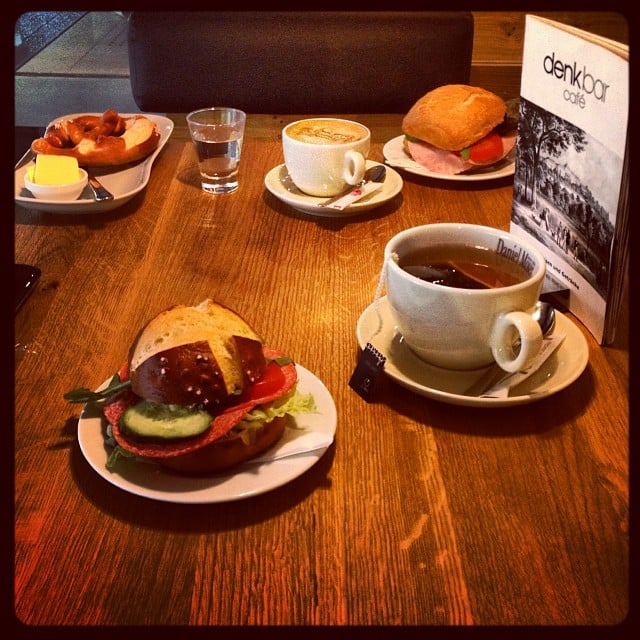 A breakfast table with food for two