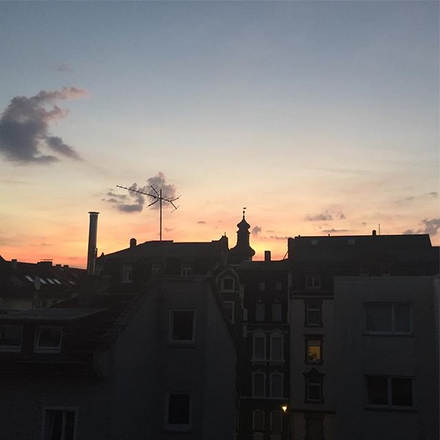 Sunset over a row of houses